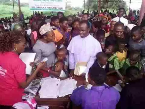 Father Mbaka Continues His Charity Work For The Poor, Gives Them Cheque (Photos)